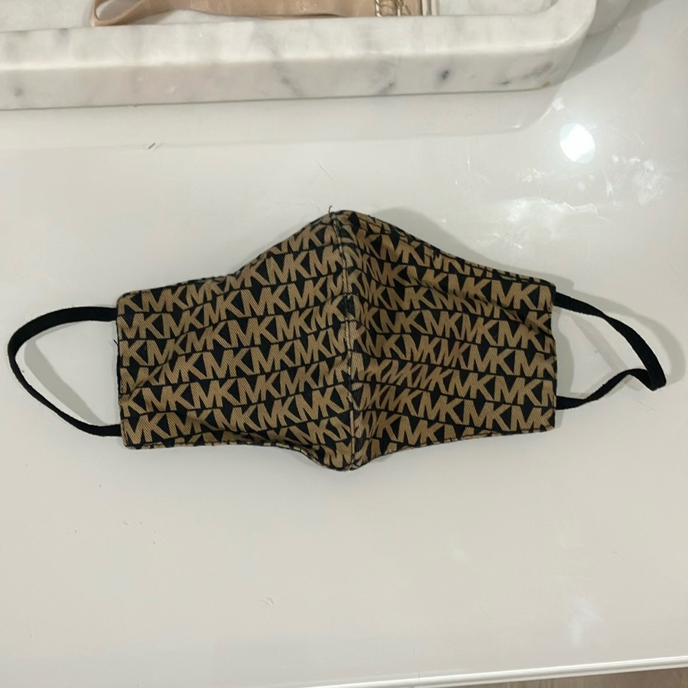 *5 listings for $25. Michael Kors face mask.